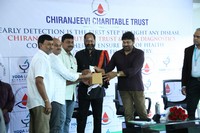 Megastar Distributes Health Cards Photos